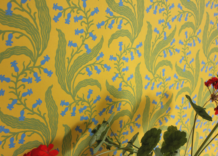 Ellen-merchant-bluebells-Butter-wallpaper-yellow-base-colour-paper-blue-green-flowers-block-printed-british-designer