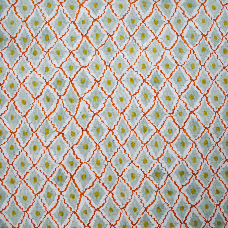 Lowri-textiles-diamond-harlequin-fabric-printed-blockprinted-green-red-yellow-fabric-cotton-linen-diamond-ditsy-pattern