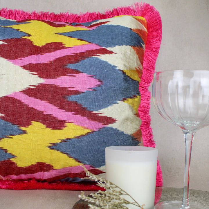 my-doris-silk-turkish-ikat-pink-fringed-cushion-blue-yellow-white-red-handmade-fringed-edge