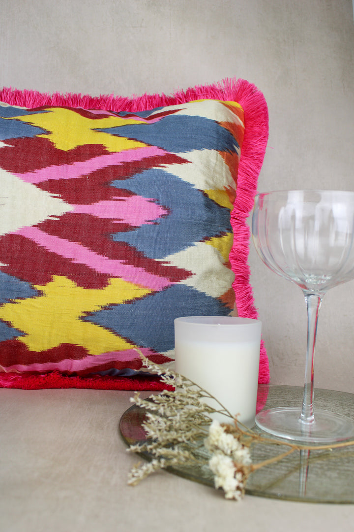 my-doris-silk-turkish-ikat-pink-fringed-cushion-blue-yellow-white-red-handmade-fringed-edge