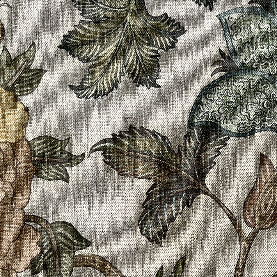 Josephine-Munsey-Chameleon-Trail-linen-fabric-textile-British-designer-floral-trail-botanical-print-chameleon-lemon-and-light-colour-stone-blues-yellow-green-leaves-cream-base-textile