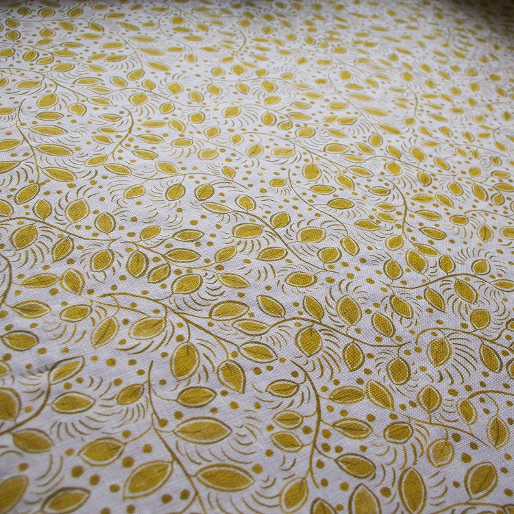 Lowri-textiles-linen-leaf-leaves-trailing-ditsy-print-little=leaves-yellow-upholstry-textile-fabric-blinds-curtains-floral-small-printed-white-yellow-