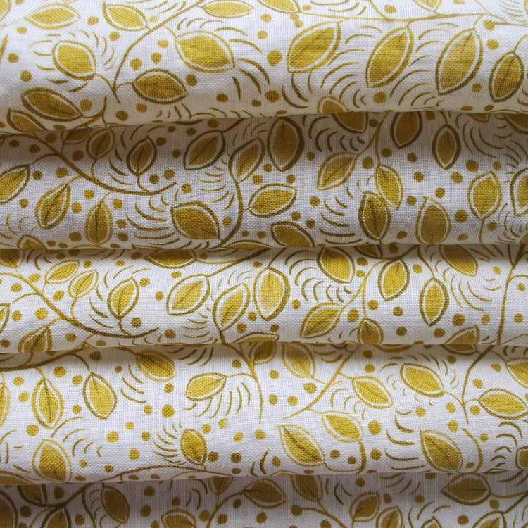 Lowri-textiles-linen-leaf-leaves-trailing-ditsy-print-little=leaves-yellow-upholstry-textile-fabric-blinds-curtains-floral-small-printed-white-yellow-