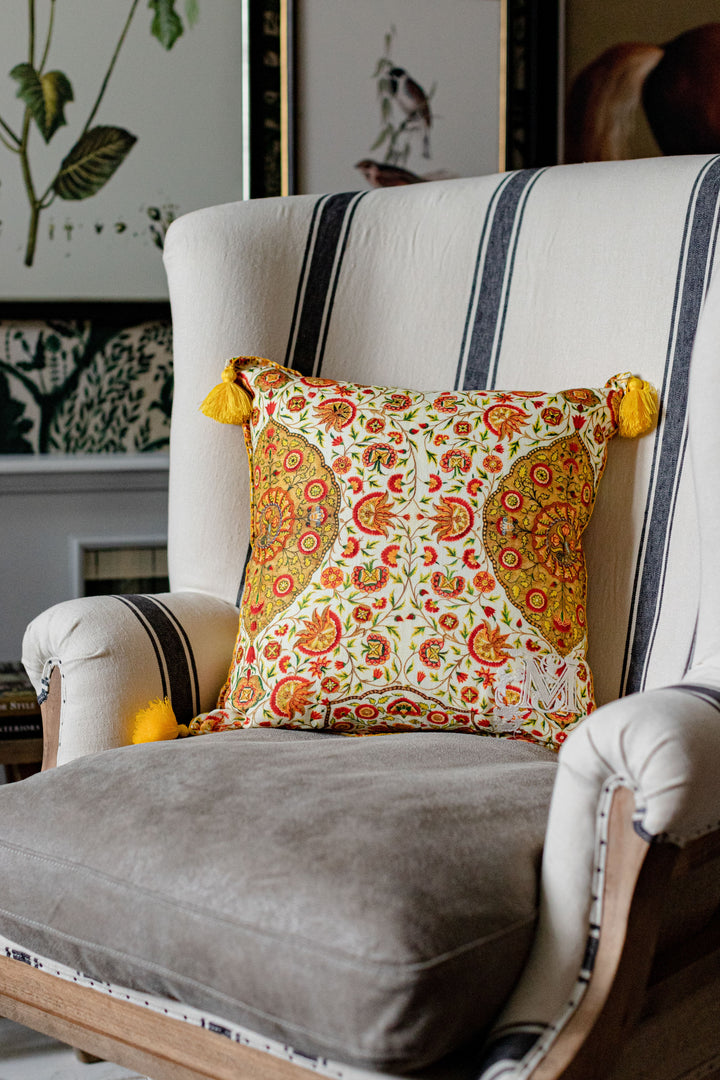 mind the gap red and yellow cushion on black and white stripe chair yellow tassels