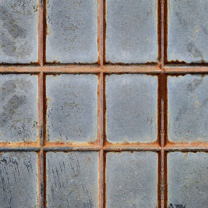 mind-the-gap-foundry-wall-wallpaper-the-factory-collection-rustic-rusty-tile-arrangement-adding-depth-and-intrigue-for-a-maximalist-statement-interior